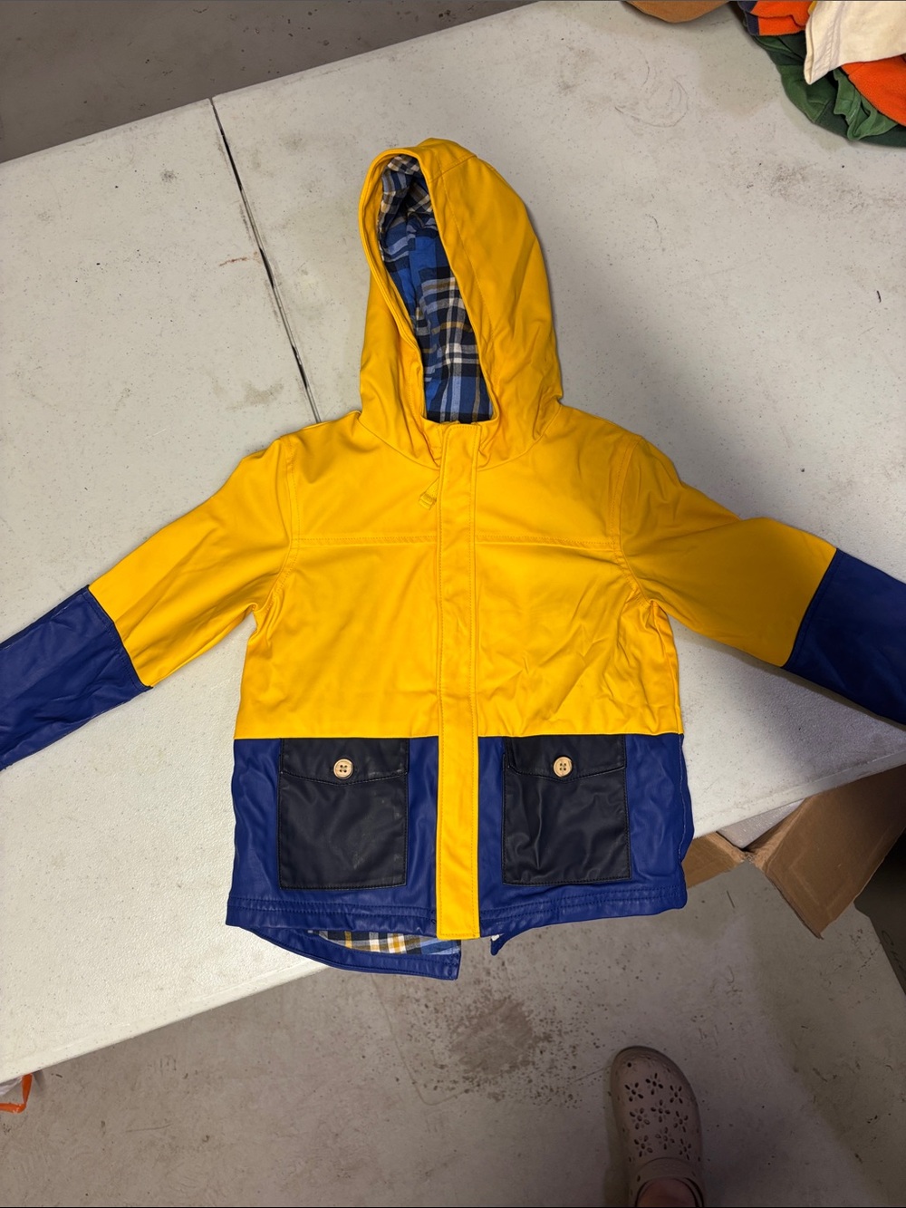 Genuine kids, yellow and blue rain jacket